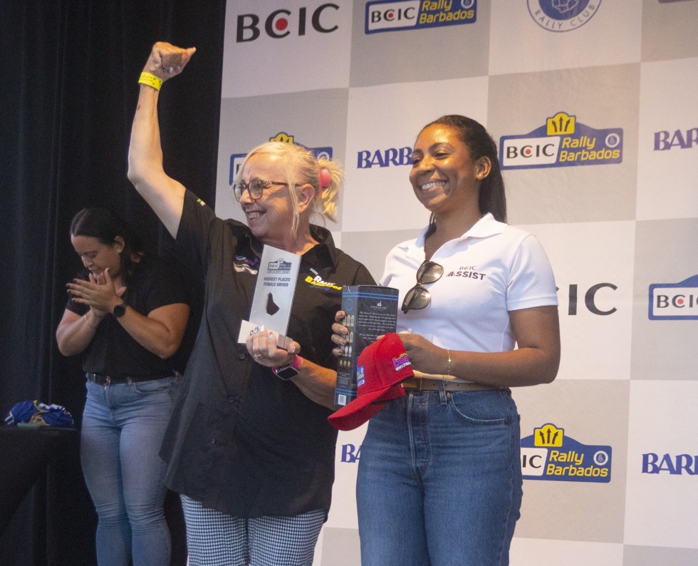 Alexandra Leacock, Branch Manager, BCIC Barbados, with Highest-placed Female Driver Cheryl Spencer