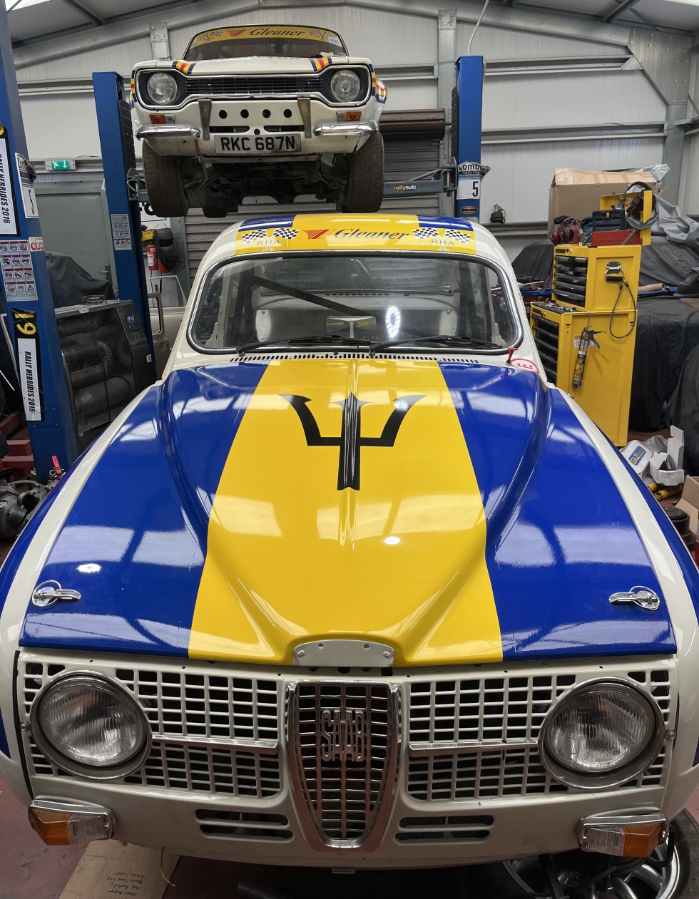 Robin Hamilton’s Saab 96 in his workshop in Scotland, with last year’s Ford Escort in the background