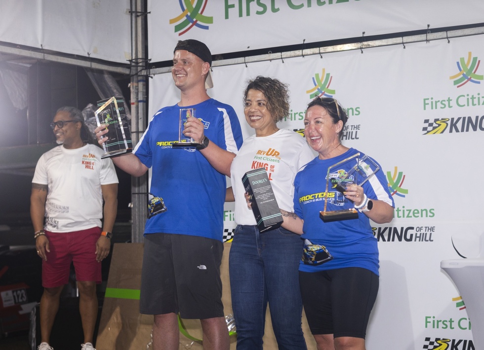 King of the Hill winners Joe Cunningham and Kari Bates flank First Citizens CEO Claire Jordan, with Area Manager Rodney Mayers background left. Photo courtesy BRC/Nicholas Bhajan